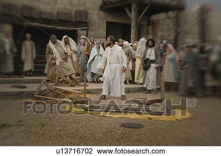 Stock Image - Jesus overturns the table. Fotosearch