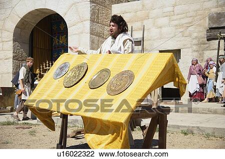 Stock Image - Man in Temple. Fotosearch