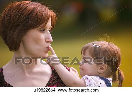 Picture - Mother and child play together. Fotosearch