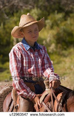Stock Photo - Portrait of a cowboy. Fotosearch