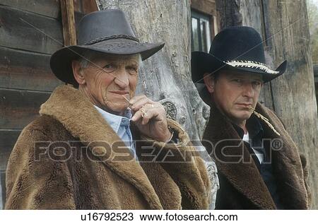 Portrait of a pair of cowboys View Large Photo Image Stock Image - Portrait of a pair of cowboys. Fotosearch