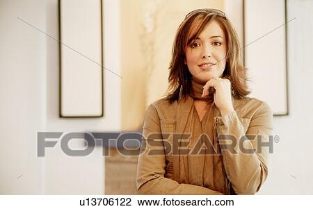 Stock Image - Portrait of attractive brunette. Fotosearch