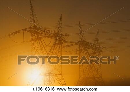 Silhouette of electricity pylons View Large Photo Image Stock Photograph - Silhouette of electricity pylons. Fotosearch