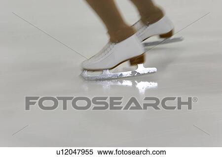 Stock Photography - Skating on ice. Fotosearch