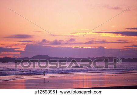 Sunset on the beach View Large Photo Image Stock Image - Sunset on the beach. Fotosearch