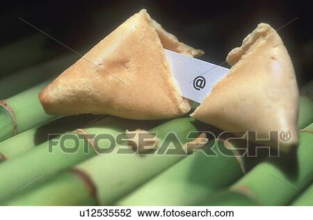 The at sign in a fortune cookie View Large Photo Image Stock Image - The at sign in a fortune cookie. Fotosearch
