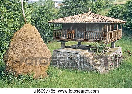 Traditional Stone Granary (Horreo) with Haystack in Asturias View Large Photo Image Stock Photography - Traditional Stone Granary (Horreo) with Haystack in Asturias. Fotosearch
