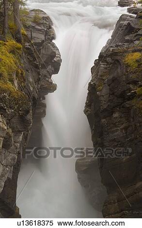 Waterfall between rocks View Large Photo Image Stock Photography - Waterfall between rocks. Fotosearch