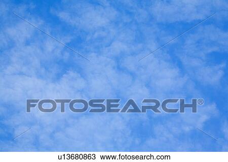 Stock Image - Blue sky with clouds. Fotosearch