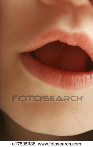 Stock Photograph - Closeup of a baby's mouth. Fotosearch
