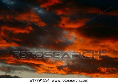 Clouds at sunset View Large Photo Image Picture - Clouds at sunset. Fotosearch