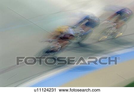 Cyclists racing on bike track View Large Photo Image Stock Image - Cyclists racing on bike track. Fotosearch