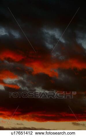 Dark clouds at sunset View Large Photo Image Stock Image - Dark clouds at sunset. Fotosearch