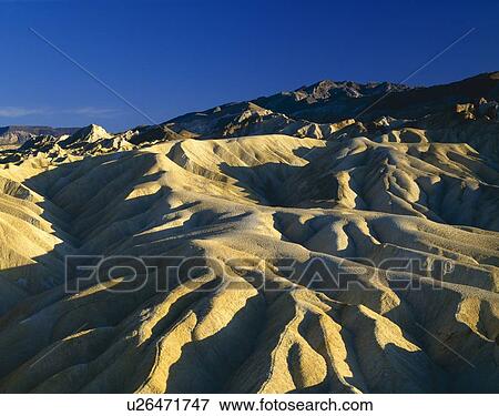 Eroded slopes in Golden Canyon, Death Valley National Park View Large Photo Image Stock Photo - Eroded slopes in Golden Canyon, Death Valley National Park. Fotosearch