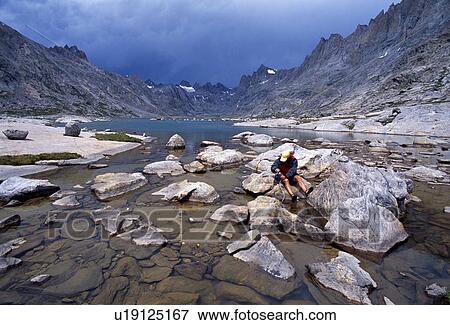 Stock Photo - Filtering Titcomb Lake, Wind River Range. Fotosearch