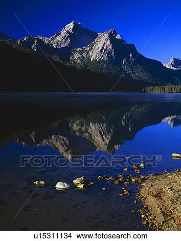 Mountain reflections in lake, Sawtooth National Forest View Large Photo Image Picture - Mountain reflections in lake, Sawtooth National Forest. Fotosearch