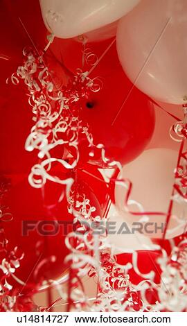 Stock Photo - Red and white balloons. Fotosearch
