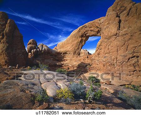Redrock desert landscape, Turret Arch, Arches National Park View Large Photo Image Stock Image - Redrock desert landscape, Turret Arch, Arches National Park. Fotosearch
