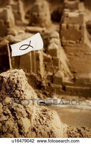 Sandcastle with flag View Large Photo Image Stock Image - Sandcastle with flag. Fotosearch