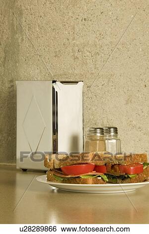 Sandwhich at restaurant View Large Photo Image Stock Photograph - Sandwhich at restaurant. Fotosearch