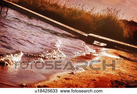 Stock Image - Shoreline and dock. Fotosearch