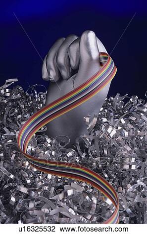 Silver hand holding computer cable View Large Photo Image Stock Image - Silver hand holding computer cable. Fotosearch