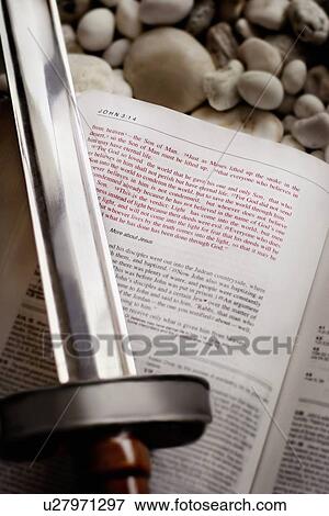 Sword over the Bible View Large Photo Image Stock Photo - Sword over the Bible. Fotosearch