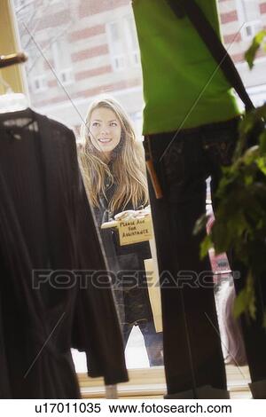 Woman window shopping View Large Photo Image Stock Photography - Woman window shopping. Fotosearch