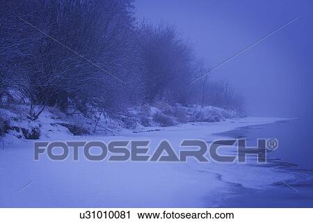 Stock Image - A beautiful winter scene. Fotosearch