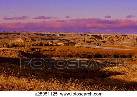 Stock Photography - A hilly landscape. Fotosearch