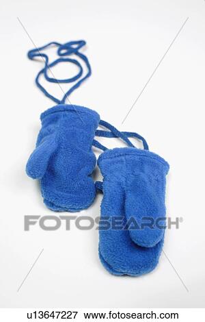 A pair of blue mittens View Large Photo Image Stock Photo - A pair of blue mittens. Fotosearch