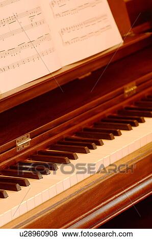 A piano with music View Large Photo Image Stock Photo - A piano with music. Fotosearch