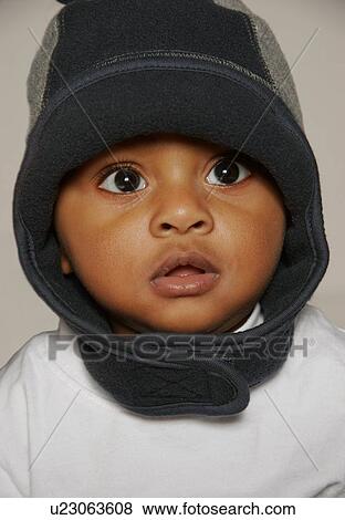 Stock Photo - Baby wearing toque. Fotosearch