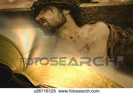 Bible with Jesus on cross in background View Large Photo Image Stock Photography - Bible with Jesus on cross in background. Fotosearch