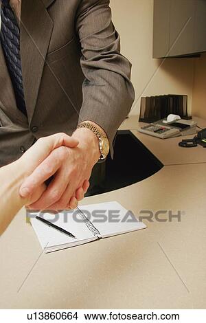Business handshake View Large Photo Image Picture - Business handshake. Fotosearch