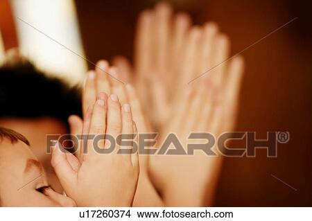 Picture - Children praying. Fotosearch