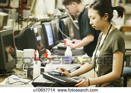 Cleaning a keyboard View Large Photo Image Picture - Cleaning a keyboard. Fotosearch