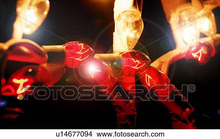 Picture - Close up of Christmas lights. Fotosearch