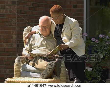 Couple reading View Large Photo Image Stock Photo - Couple reading. Fotosearch
