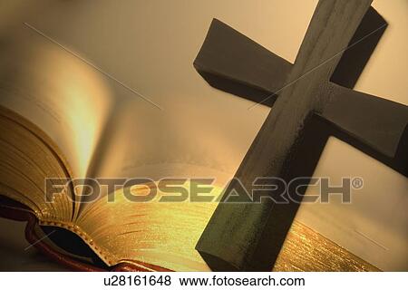 Stock Photo - Cross with open bible. Fotosearch