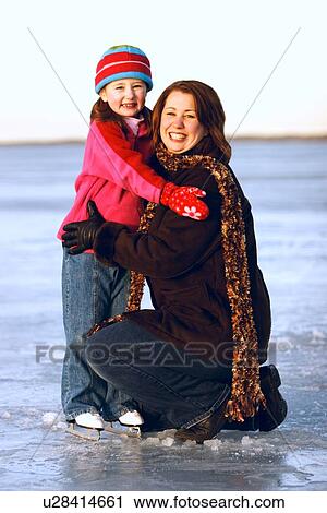 Daughter on skates View Large Photo Image Stock Image - Daughter on skates. Fotosearch
