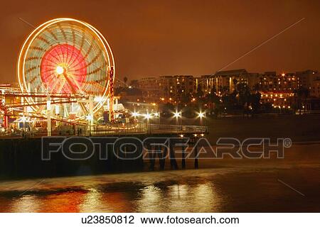Ferris wheel at night View Large Photo Image Stock Image - Ferris wheel at night. Fotosearch