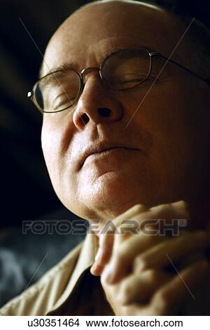Picture - Man deep in thought. Fotosearch