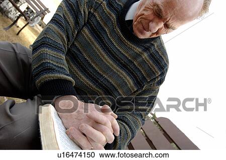 Stock Image - Man prays. Fotosearch