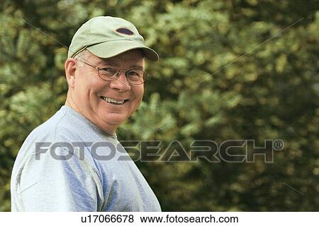 Stock Photo - Man with a hat. Fotosearch