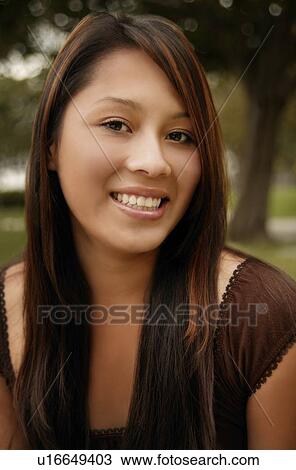Stock Image - Portrait of a young woman. Fotosearch