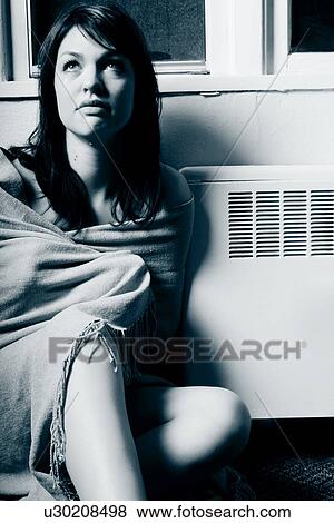 Sitting by a heating vent View Large Photo Image Stock Photo - Sitting by a heating vent. Fotosearch