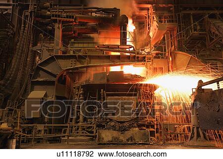 Stock Image - Sparks falling from work shop. Fotosearch