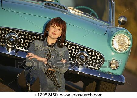 Woman and her car View Large Photo Image Stock Image - Woman and her car. Fotosearch