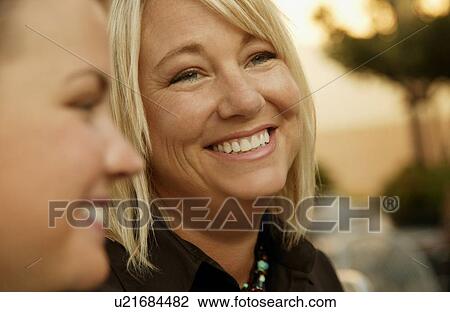 Woman smiles View Large Photo Image Stock Image - Woman smiles. Fotosearch